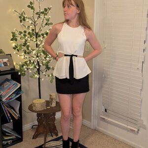 Cute out white top with black belt accent